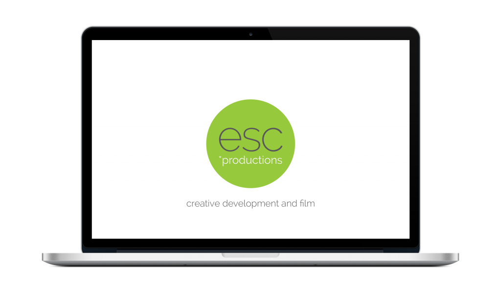 laptop with esc productions logo in green circle