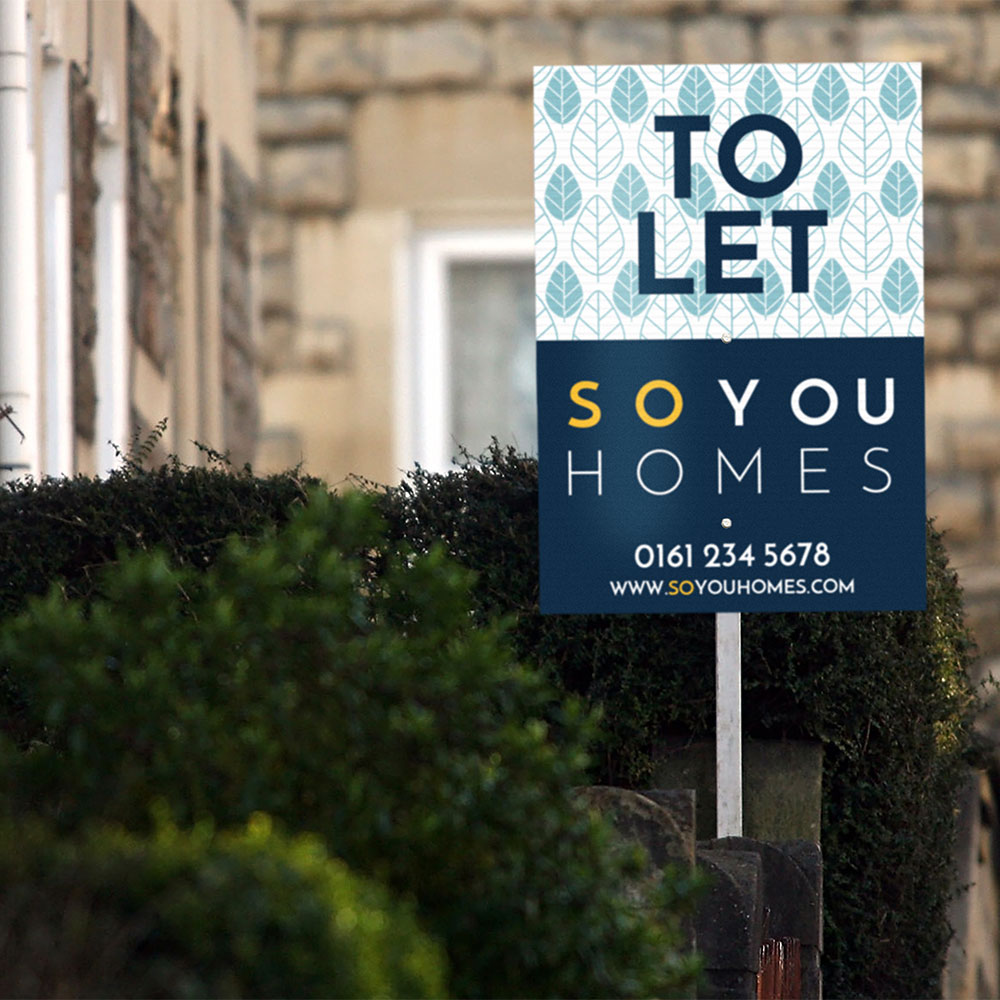 So You Homes To Let Sign with patterned background, infront of house surrounded with bushes
