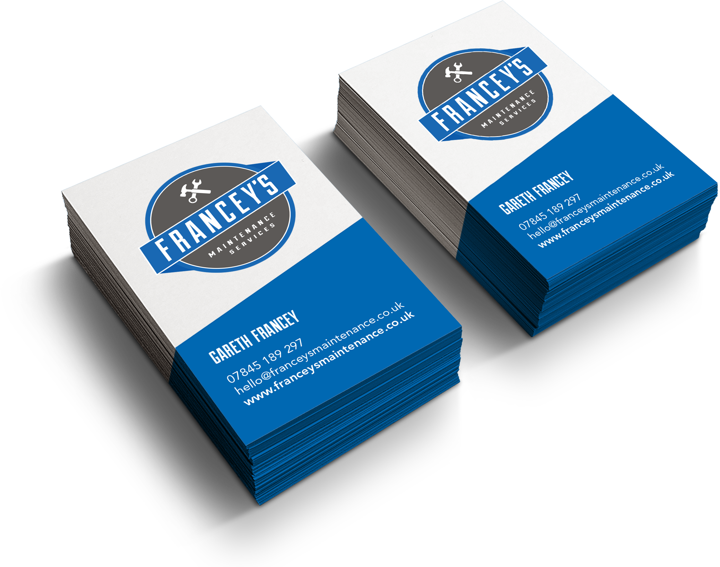 Stack of blue and white business cards with Francey's Maintenance logo and contact details